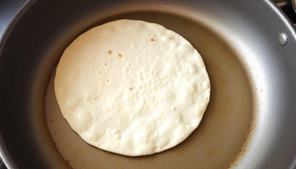 tortilla placed in skillet