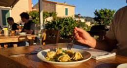 Food and Dining Experiences in Sardinia: Culurgiones, Porceddu, and Vermentino
